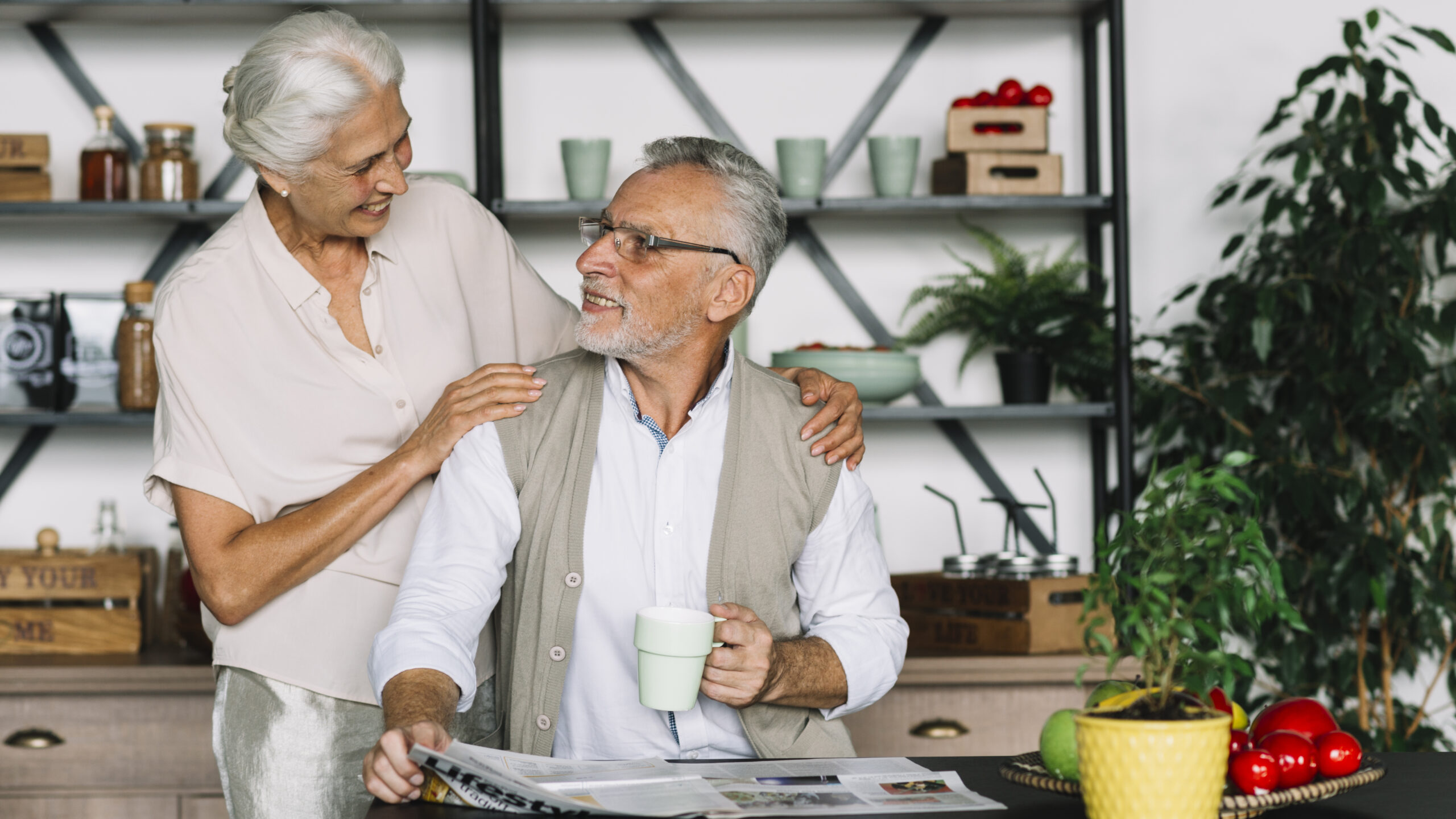 a man and woman standing in a kitchen, Retirement Planning